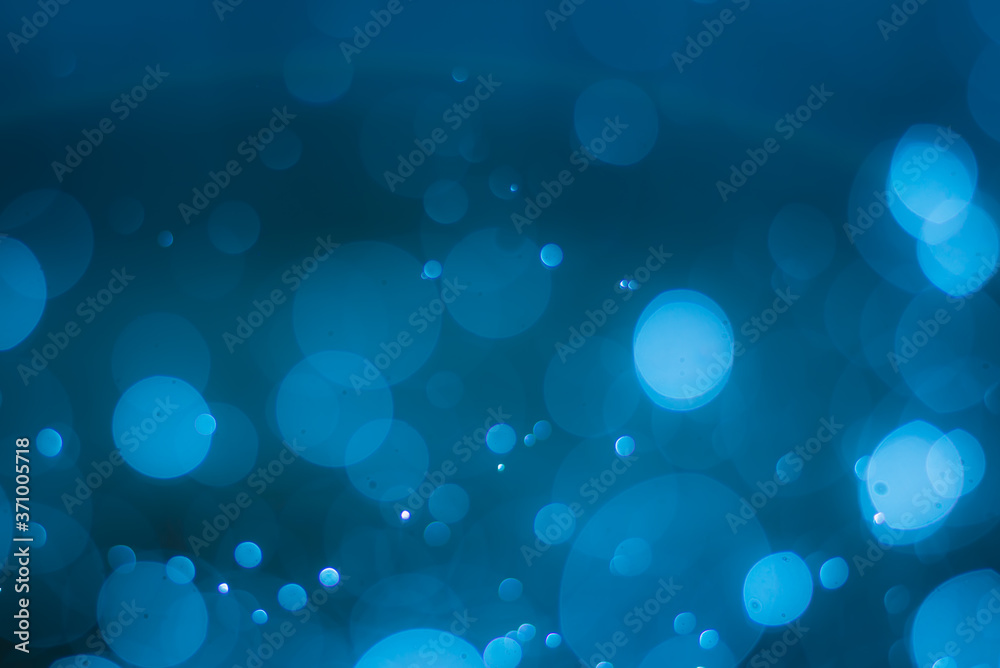 abstract light bokeh with navy blue background abstract light bokeh with navy blue background