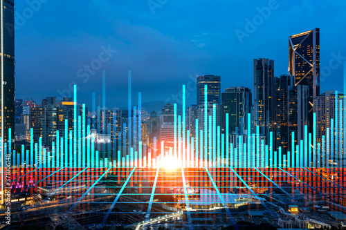 Photography FOREX graph hologram, aerial night panoramic cityscape of Kuala Lumpur