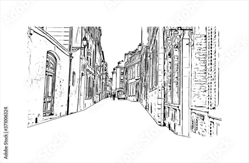 Building view with landmark of Amiens is a city in northern France, divided by the Somme river. Hand drawn sketch illustration in vector.