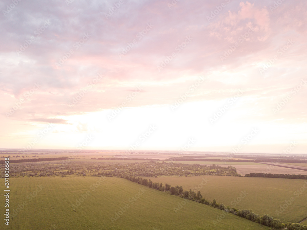 Obraz premium Aerial view. Sunset over Ukrainian agricultural fields.