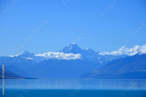 Mountain lake clouds and view of New Zealand in spring season