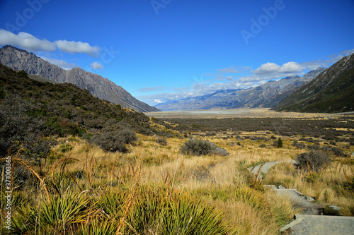 Mountain and farm on scenic road Queenstown New Zealand