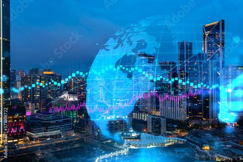 Photography FOREX graph hologram, aerial night panoramic cityscape of Kuala Lumpur