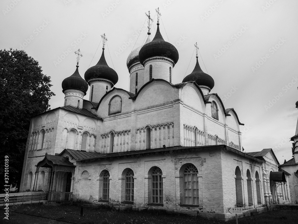 black and white photos of old white stone Russian Orthodox churches in Suzdal