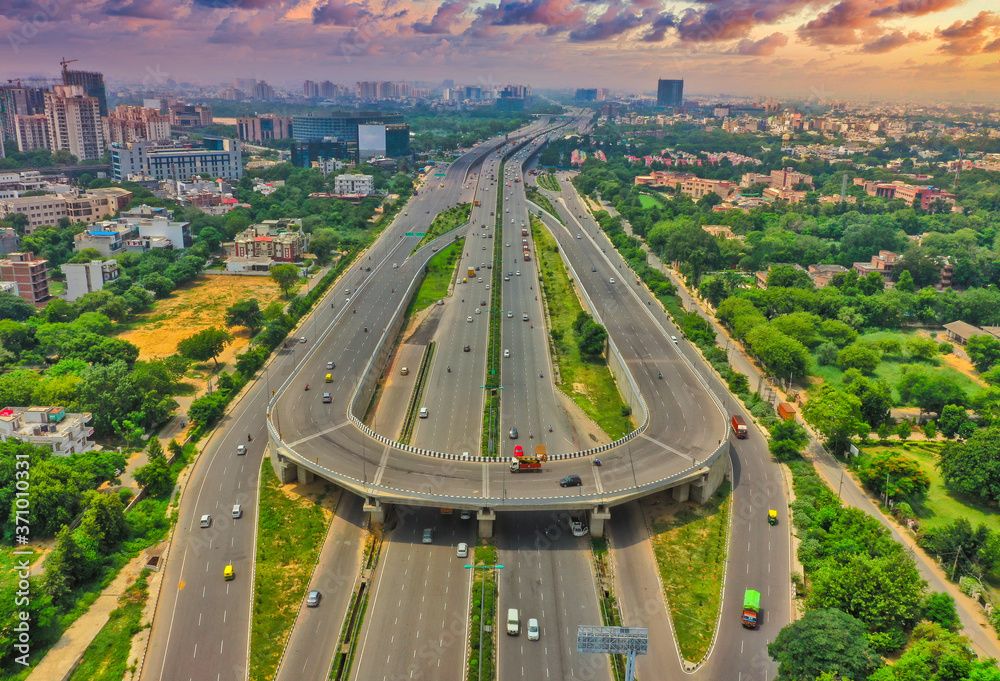 Down aerial view of empty roads near, Gurgaon city