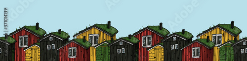 scandinavian wooden houses (yellow, red, black, green) with grass on the roof colorful seamless border on blue background