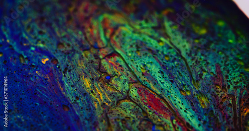 Macro Paint with Vibrant Color Palette. Oil Mixed with Rainbow Dye and Paint. Green Highlights. © Kiwitography