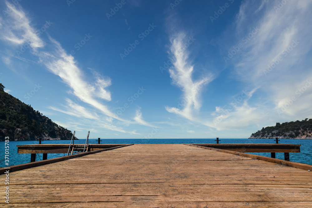 wooden pier and wonderful sea at the beach.