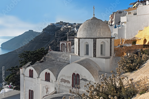 Fira church cupola at sunset in Fira, Santorini photo