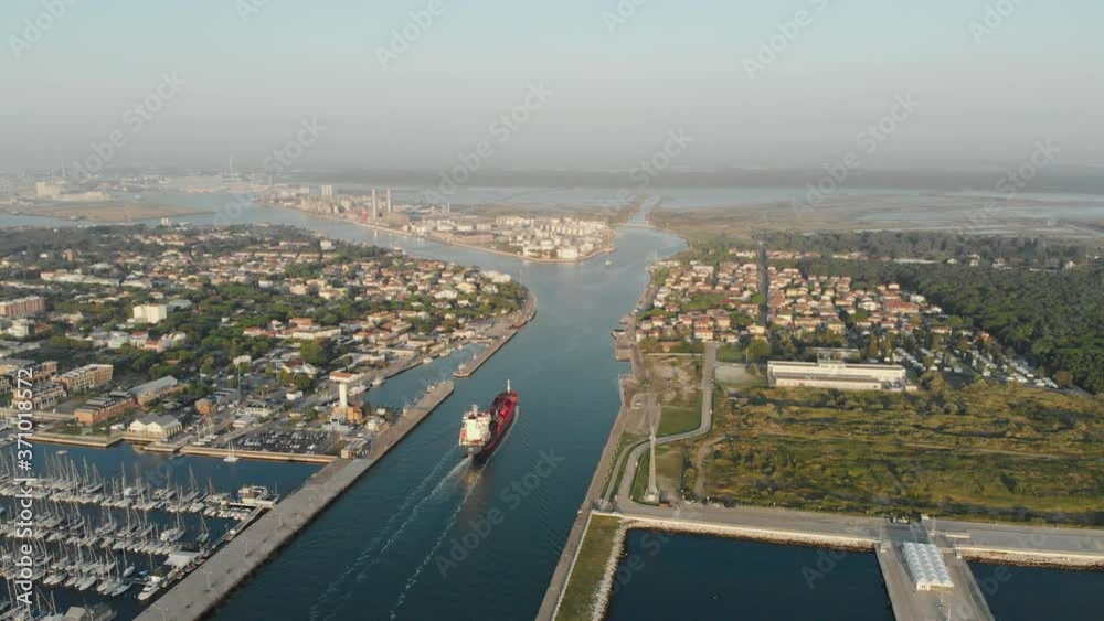 Aerial view of a infrastructure of a seaport, with various industries. Refineries and processing stations for chemicals brought on water. Similar to Beirut, Lebanon