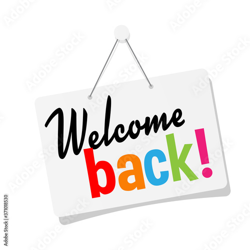 " Welcome back ! " on door sign hanging
