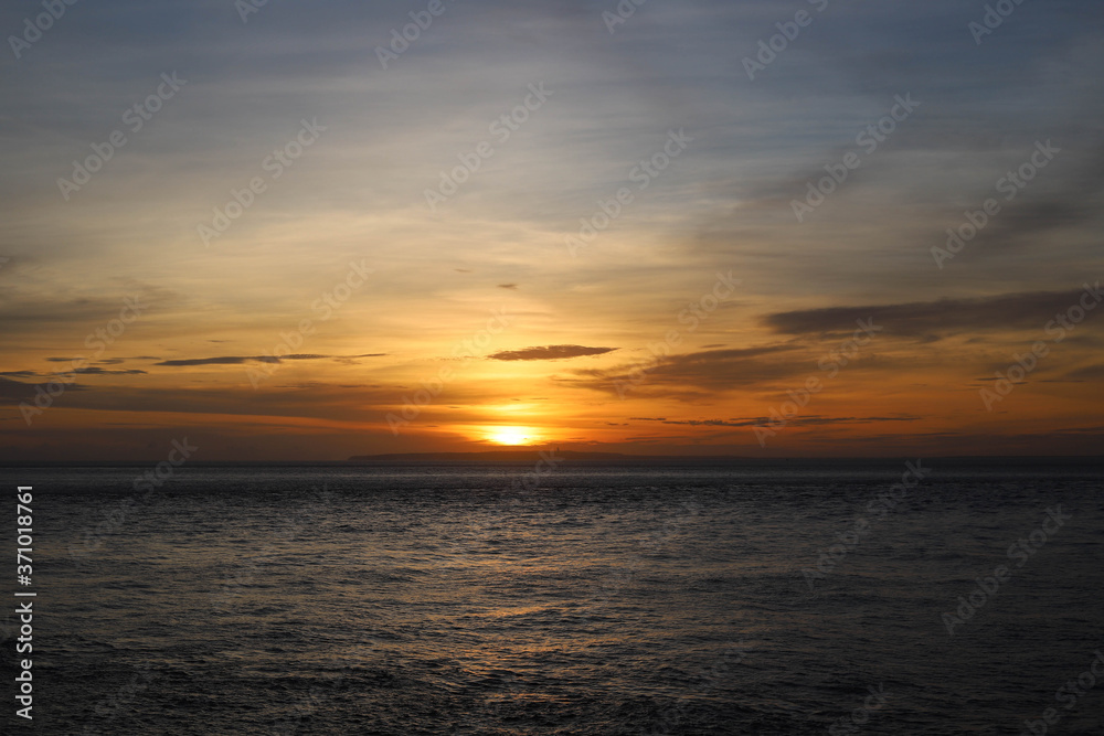 Sunset Over the Angel's Billabong beach on Nusa Penida Island, Bali, Indonesia. Amazing  view of Indian Ocean 