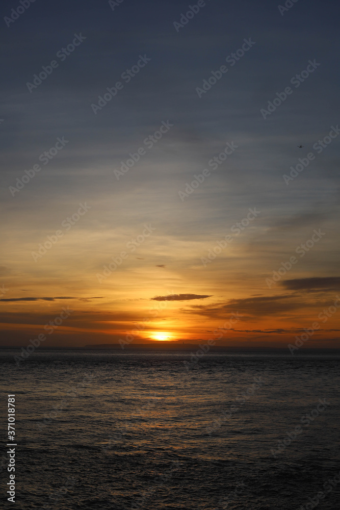 Sunset Over the Angel's Billabong beach on Nusa Penida Island, Bali, Indonesia. Amazing  view of Indian Ocean 