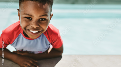 Cute boy in a swimming pool