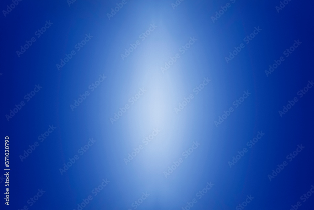 Abstract blue background. Dark blue background with light.