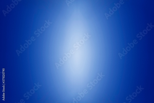 Abstract blue background. Dark blue background with light.