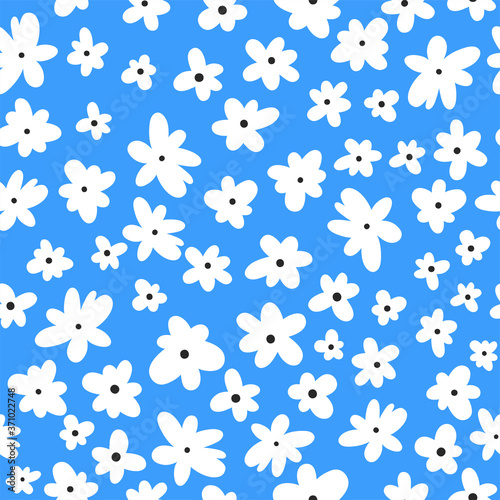 Vector seamless pattern on blue. Floral background with flowers. Natural design.