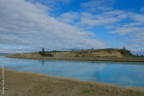 Mountain lake clouds and view of New Zealand in spring season