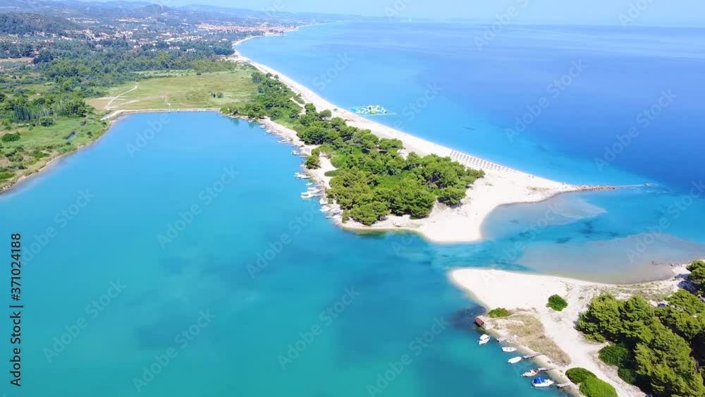 Aerial view of amazing blue lagoon for docking boats with small passage between to sand beaches Aerial view of amazing blue lagoon for docking boats with small passage between to sand beaches