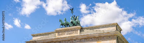 Canvas Print Brandenburg Gate with Quadriga statue as panorama background in summer, Berlin,