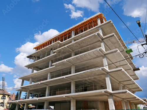 Concrete frame structure of a new multi-story apartment building in construction