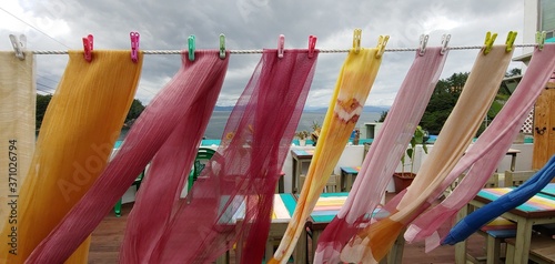 natural dyed colorful fabrics fluttering in the wind