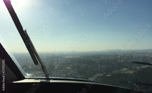 View from the control cabin of an airplane descending for landing