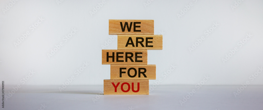 Wooden blocks with text 'we are here for you'. Beautiful white background, copy space. Business concept. - obrazy, fototapety, plakaty 