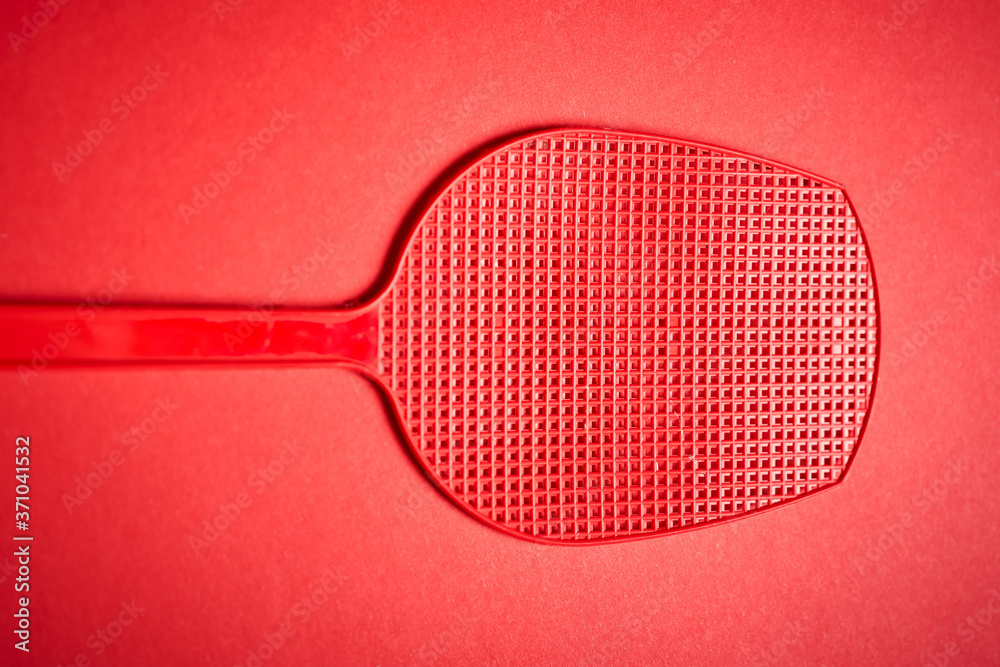 red isolated plastic fly trap on intense colored background Stock Photo
