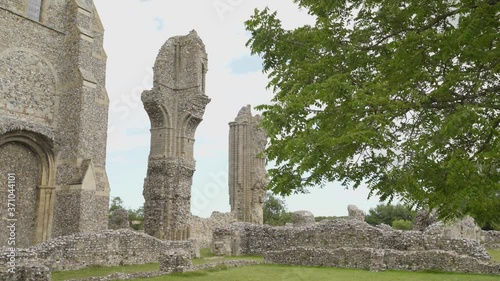 Scenic view of the ruined Benedictine priory on countryside of England photo