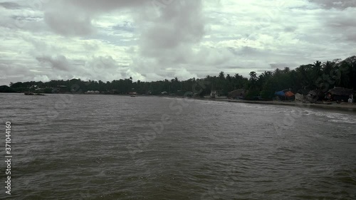 malvan beach and sea in rain photo