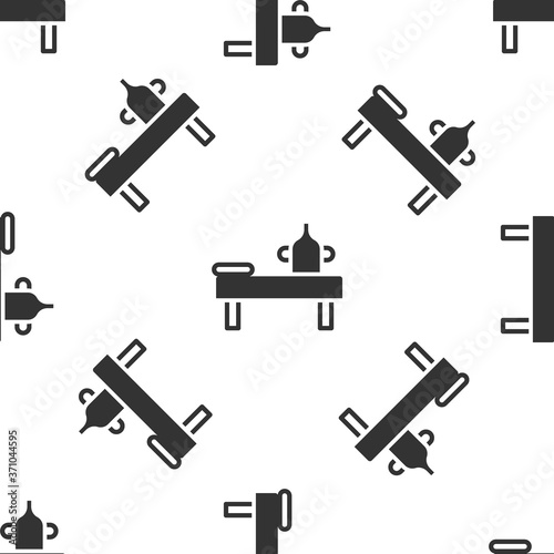 Grey Massage table with oil icon isolated seamless pattern on white background. Vector.