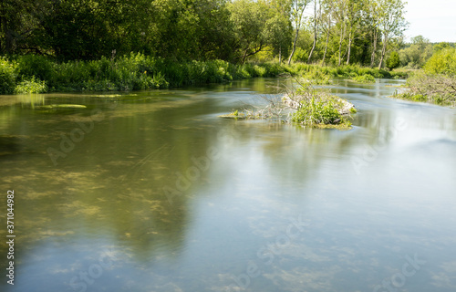 River Kennet at Chilton Foliat. Long exposure smoothes the water of this chalk river.