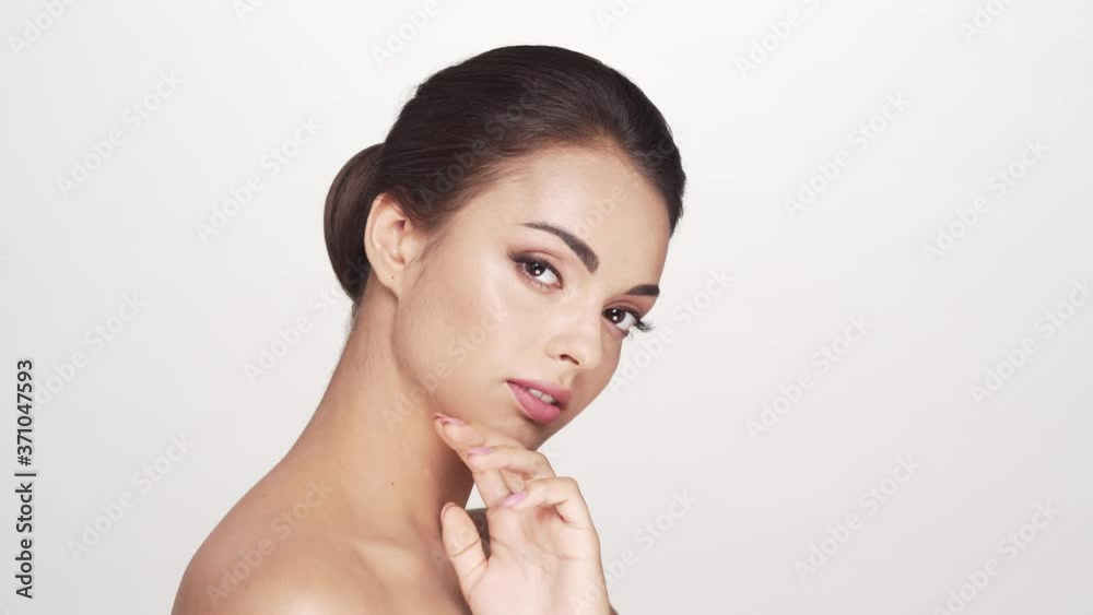 Studio portrait of young and beautiful brunette woman Studio portrait of young and beautiful brunette woman