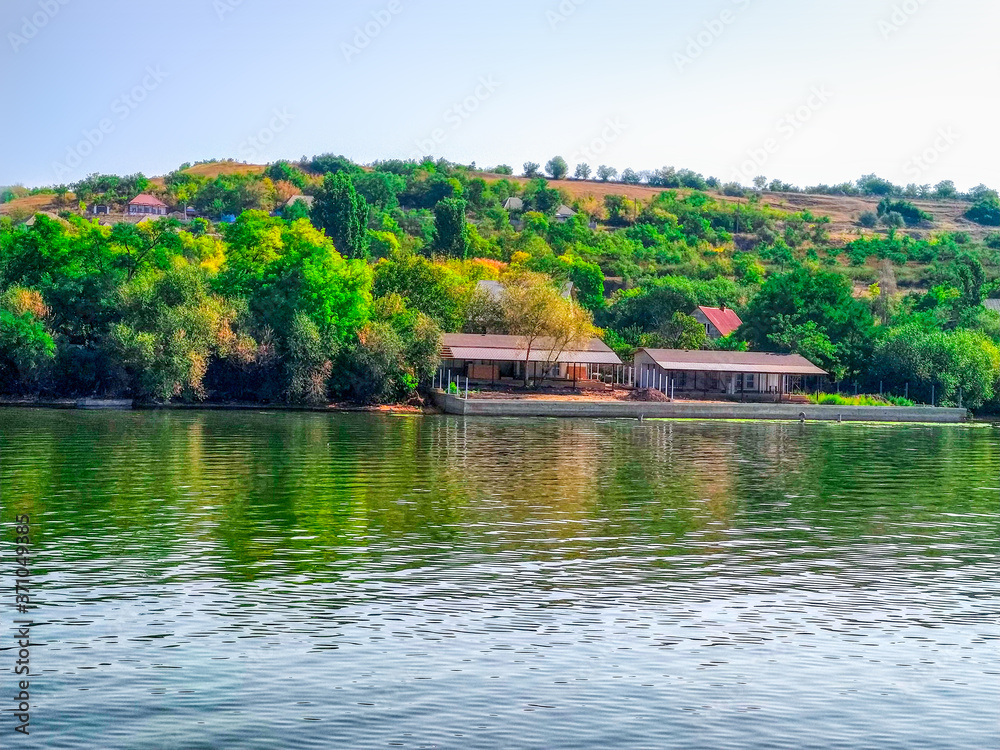 Fototapeta premium Panoramic view of fishing village on the lake