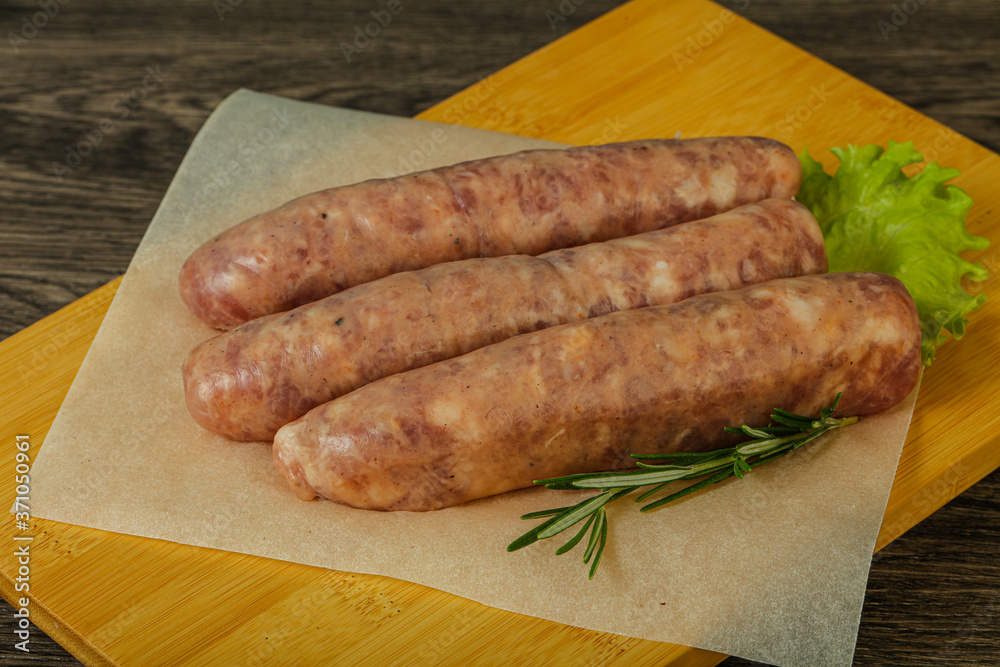 Raw pork meat sausages for grill Raw pork meat sausages for grill