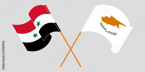 Crossed and waving flags of Syria and Cyprus