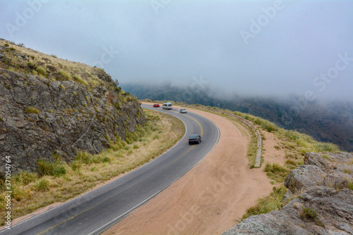 mountain roads on cloudy day with mist