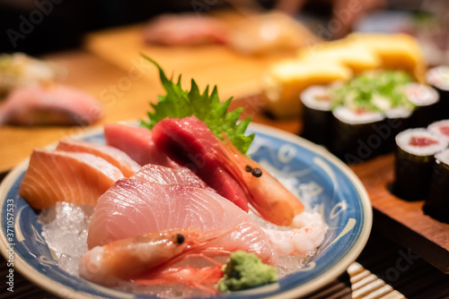 sashimi seafood on plate at restaurant