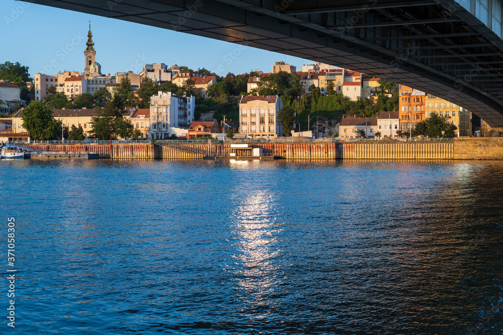 Beautiful summer view of the historic center of Belgrade from the bank of the Sava River near Branko's bridge (Brankov most), Serbia. People and signs unrecognizable.
