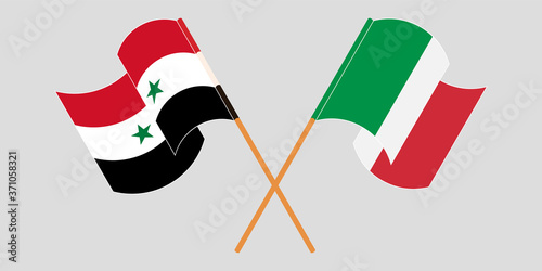 Crossed and waving flags of Syria and Italy