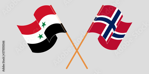 Crossed and waving flags of Syria and Norway