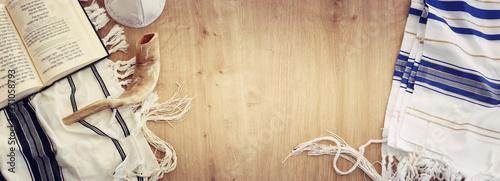 religion image of Prayer book and Shofar (horn) jewish religious symbols. Rosh hashanah (jewish New Year holiday), Shabbat and Yom kippur concept photo