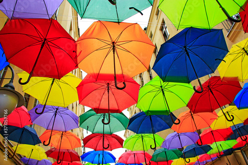 Colored umbrellas hanging at the top. Local landmark