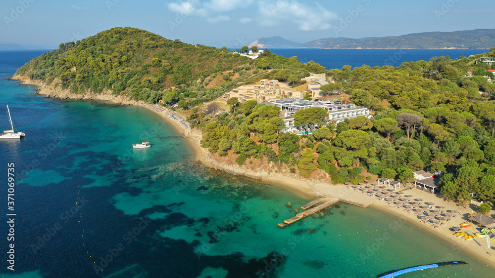 Aerial drone photo of small emerald paradise beach and resort of Xenia next to famous Koukounaries, Skiathos island, Sporades, Greece