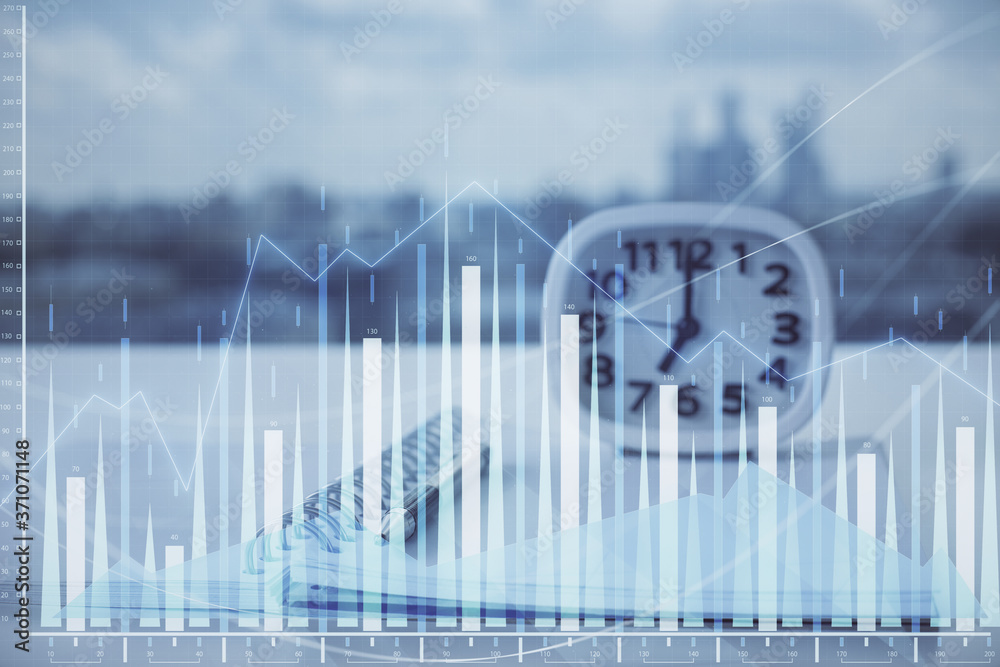 Multi exposure of financial graph drawings and desk with open notebook background. Concept of forex Multi exposure of financial graph drawings and desk with open notebook background. Concept of forex