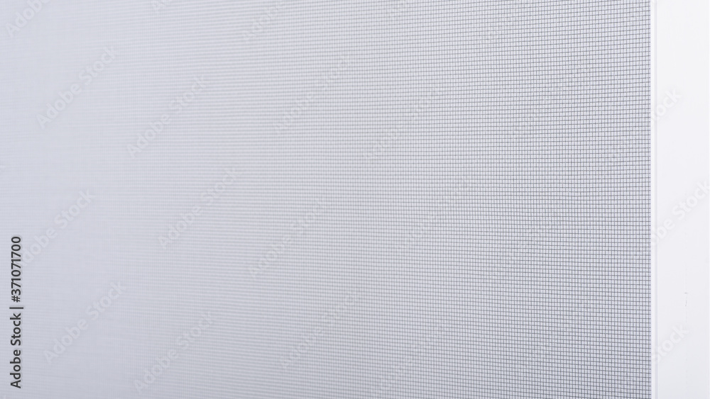 Window mosquito net close up. Reliable protection against mosquitoes, flies, and insects. Background with space for text Window mosquito net close up. Reliable protection against mosquitoes, flies, and insects. Background with space for text