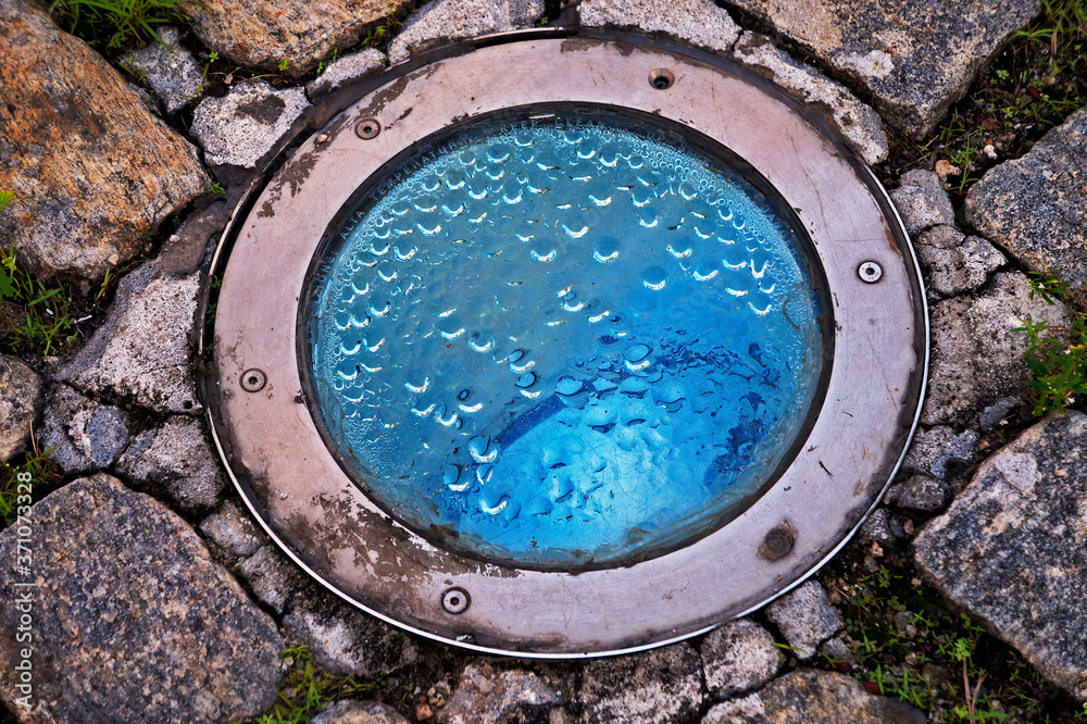 Obraz premium Floor lighting and cobblestone