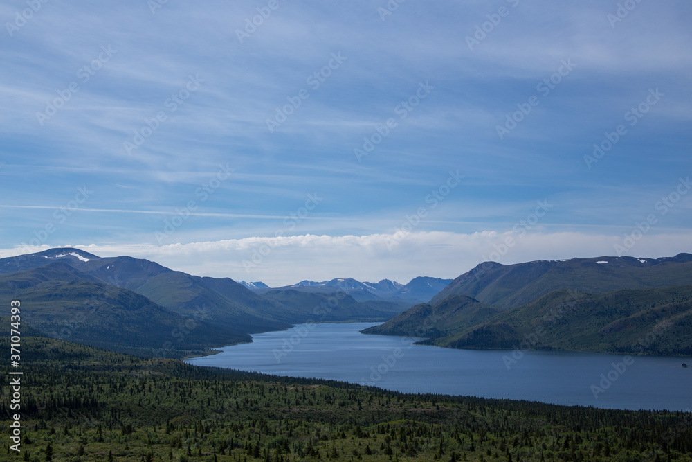 Lake surrounded by mountains near Whitehorse, Yukon Canada
