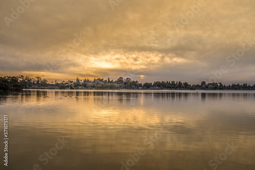 Reflection of Suburb from Lake in the Morning © Hanyun